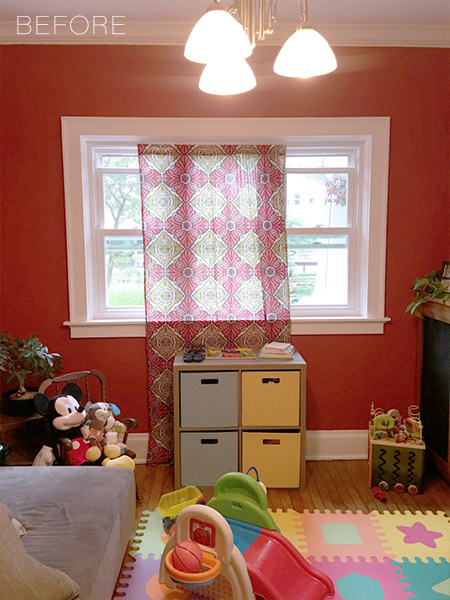 red accent wall playroom before makeover