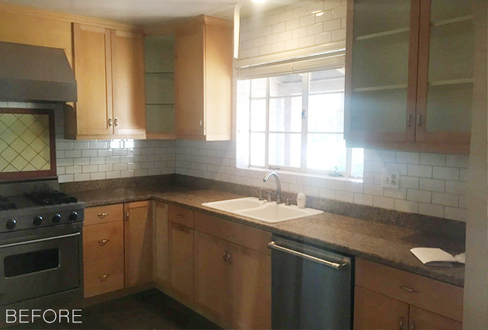 subway tile kitchen sink view before makeover